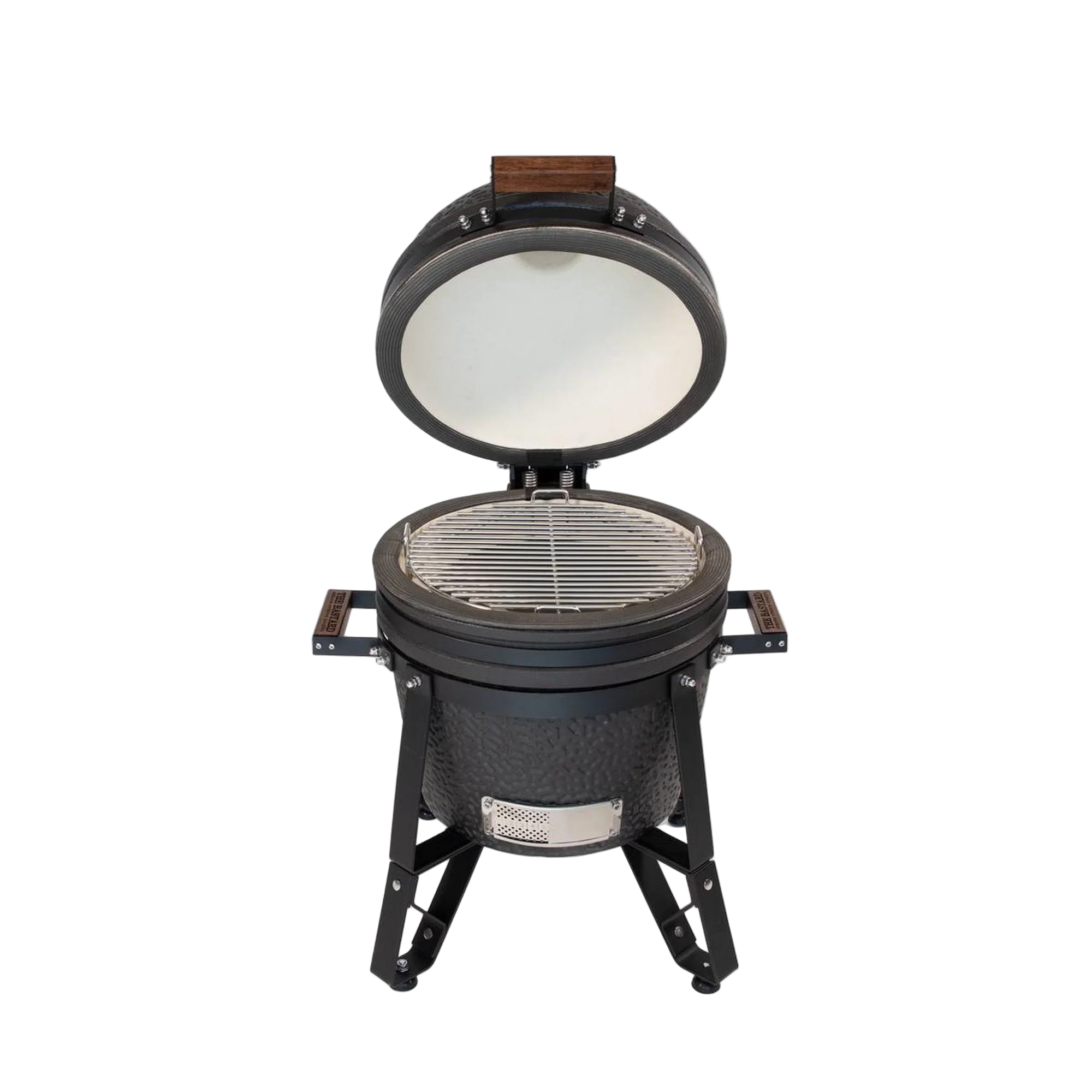 Black ceramic grill with open lid on a white background