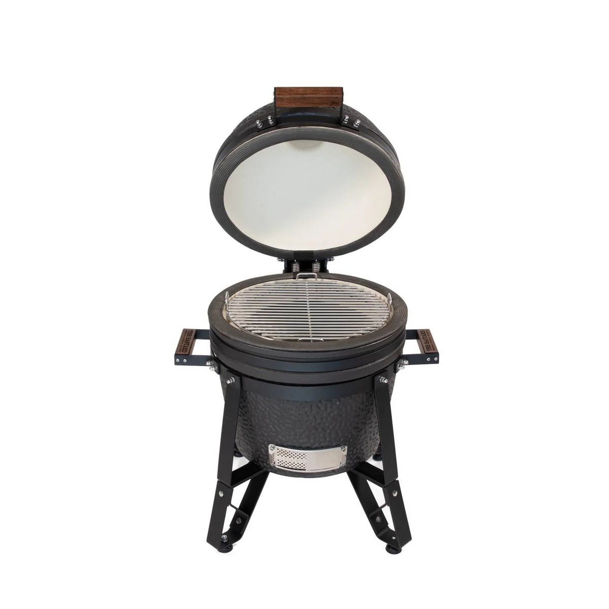 Black ceramic grill with open lid on a white background