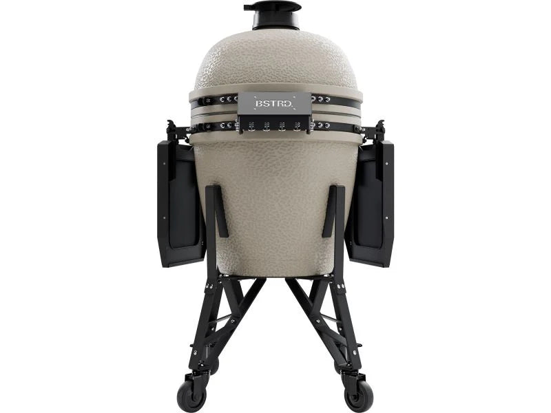 Ceramic barbecue grill with wheels on a white background