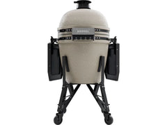Ceramic barbecue grill with wheels on a white background