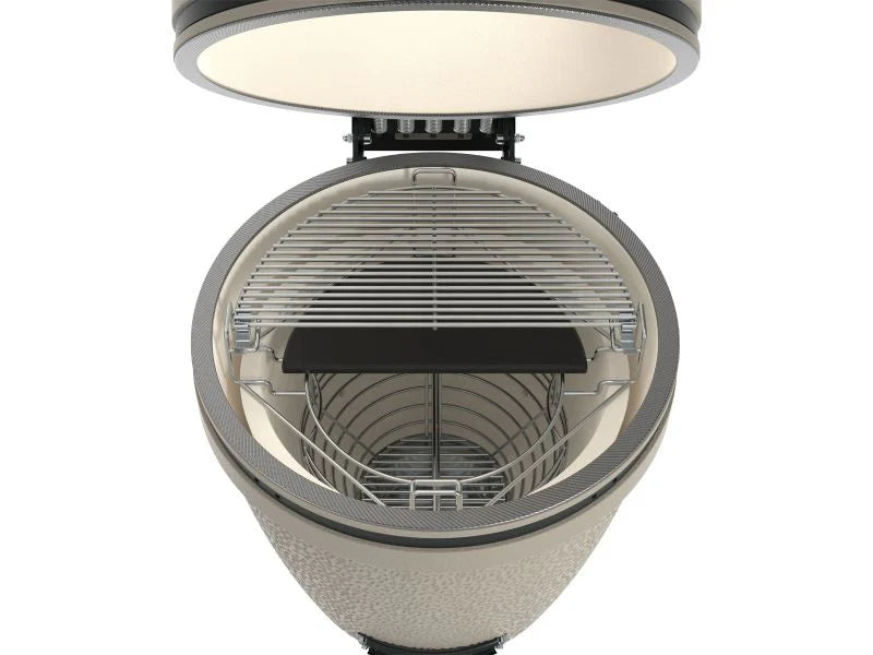 Round ceramic grill with open lid on a white background